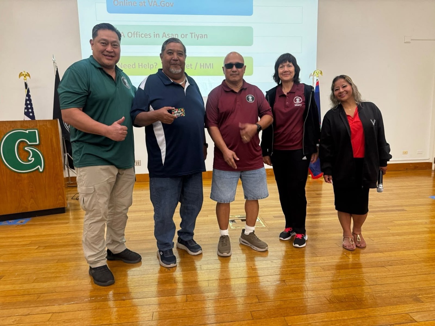 Anthony Wayne Cruz Taijeron with veterans at the HMI Symposium